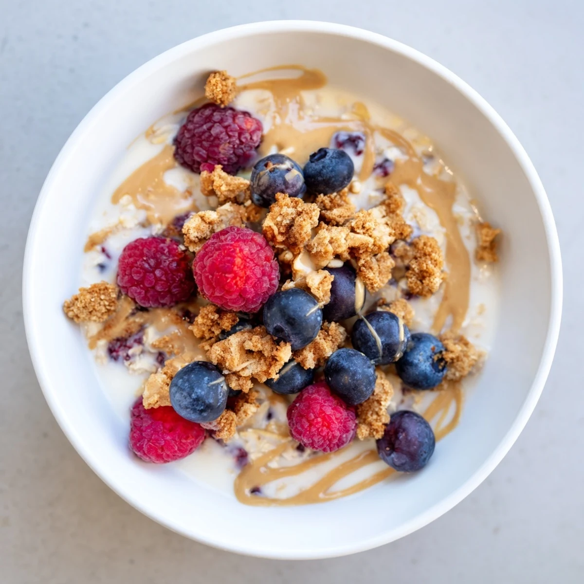A delightful breakfast image shows chilled overnight oats gourmet makeover with granola crumbles and fresh fruit.