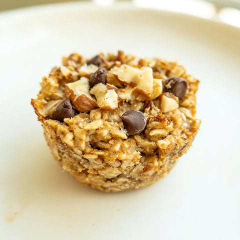 Golden, freshly baked Baked Oatmeal Cups, perfect for a quick, delicious grab-and-go breakfast.