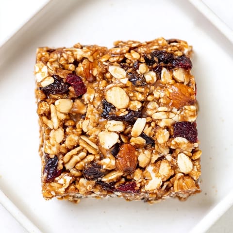 No-Bake Energy Bars, studded with nuts and fruit, ready for a satisfying, healthy snack.