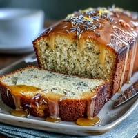 Lemon Lavender Loaf Cake is beautifully glazed, smelling of sunshine and spring.